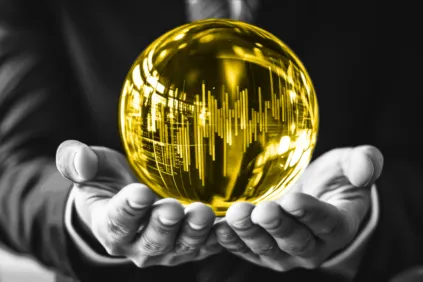 A man holding a yellow orb containing graphs and terminal output