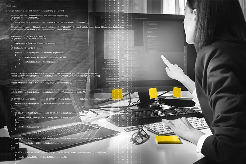 A woman looking at a computer screen, overlaid with terminal output