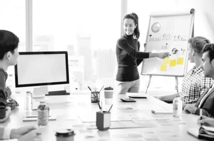 Woman presenting at a meeting
