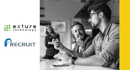 Three people talking in conference room